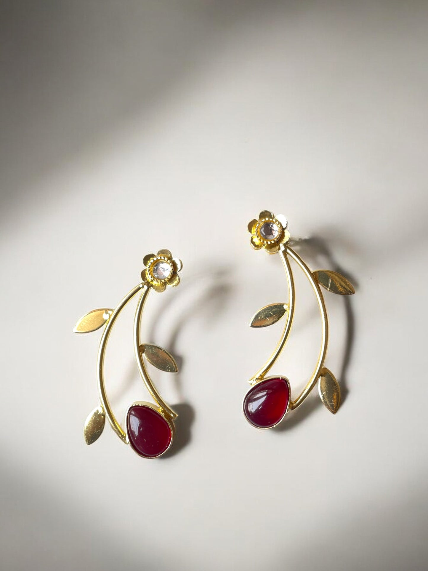 Golden Leaf Earrings with Monalisa Stone Accent