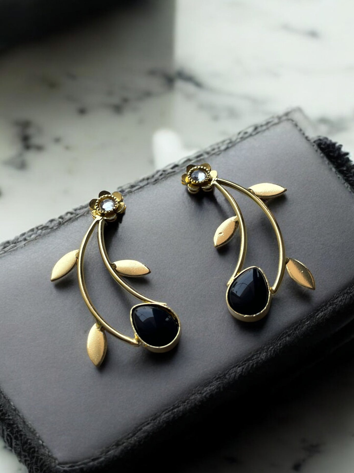 Golden Leaf Earrings with Monalisa Stone Accent