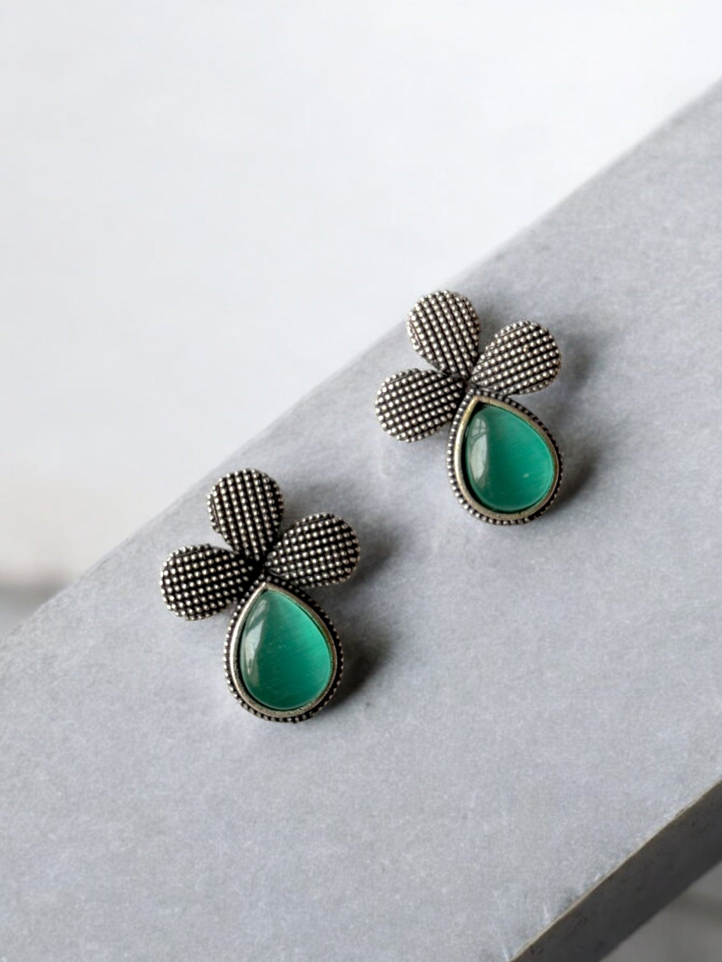 German Silver Flower Embedded Monalisa Stone Stud Earrings