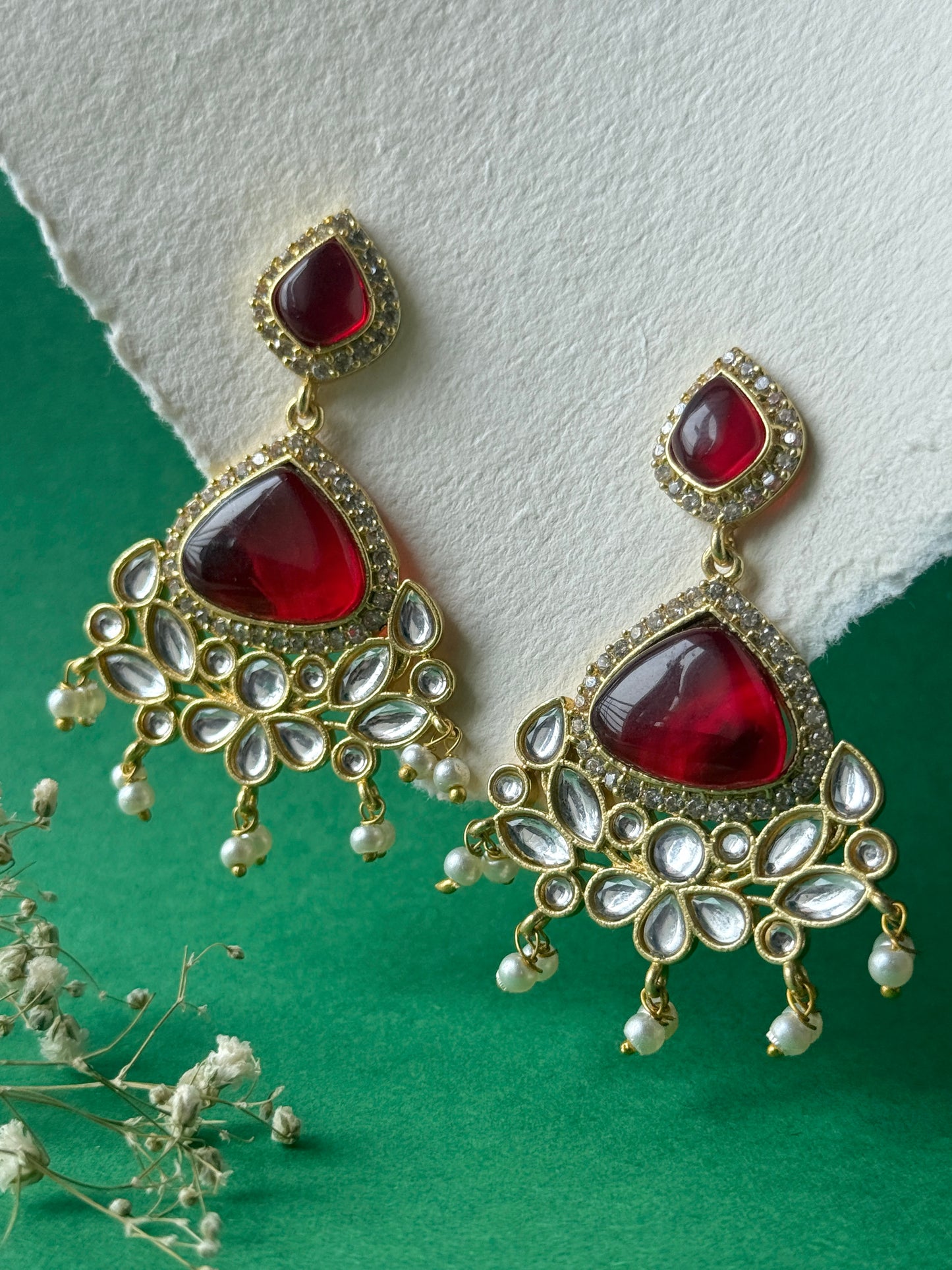 Silk Stone Embedded Party Wear Golden Earrings