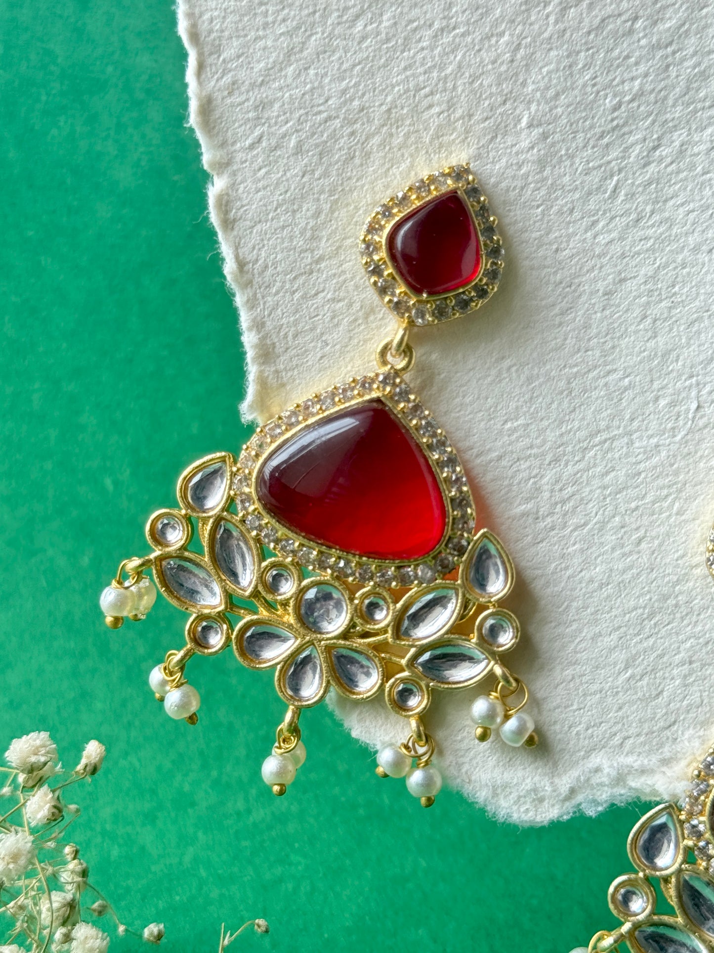 Silk Stone Embedded Party Wear Golden Earrings