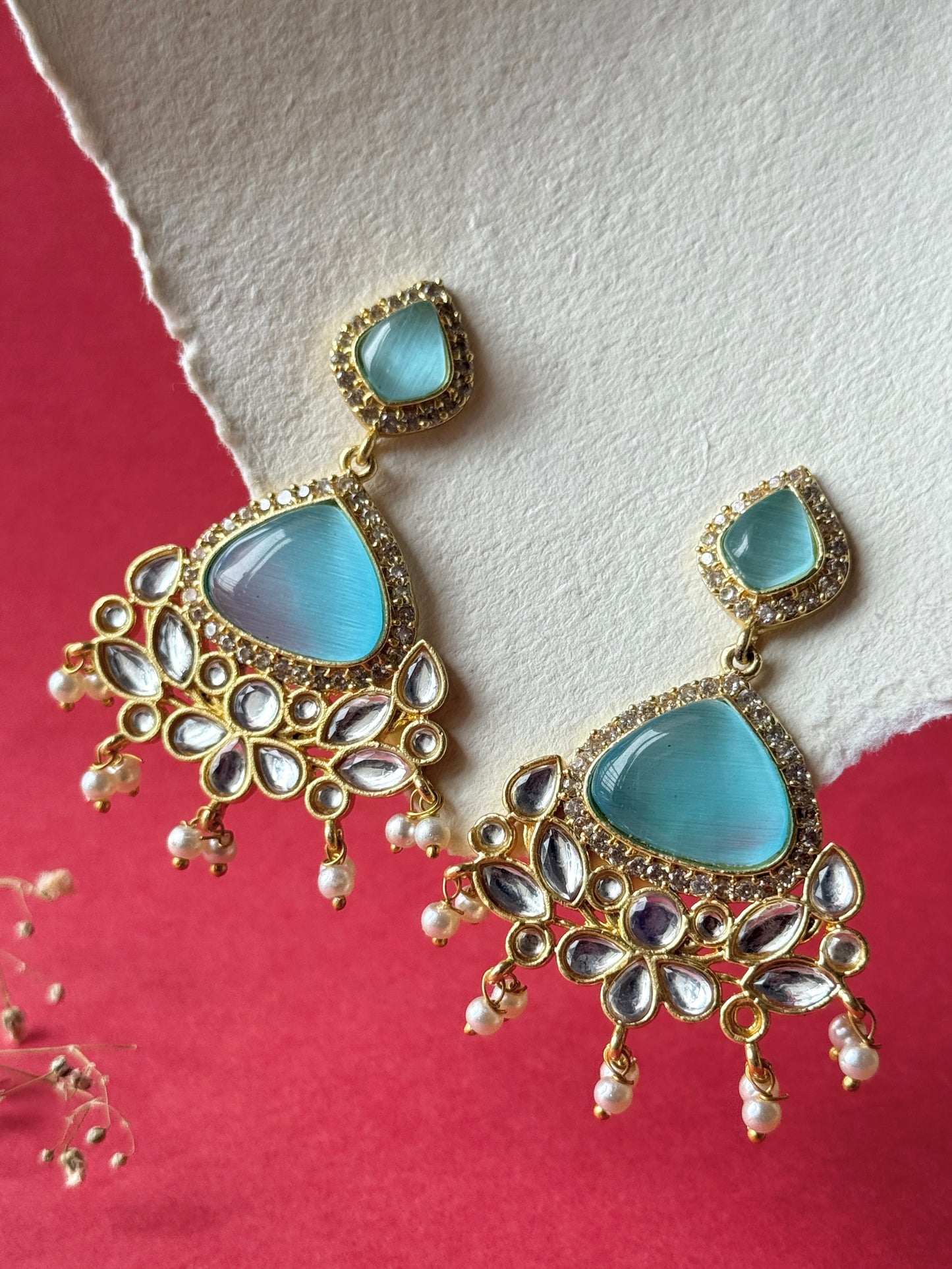 Silk Stone Embedded Party Wear Golden Earrings