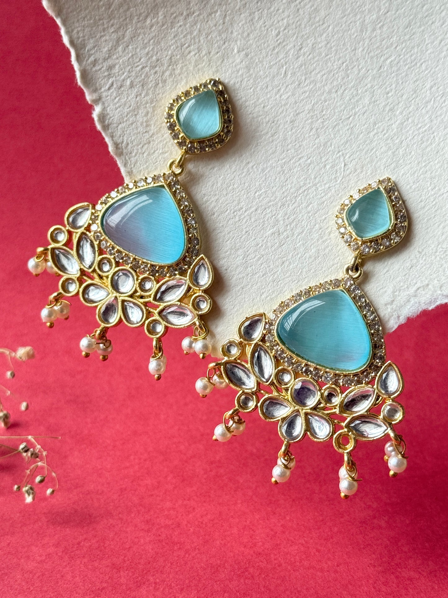 Silk Stone Embedded Party Wear Golden Earrings