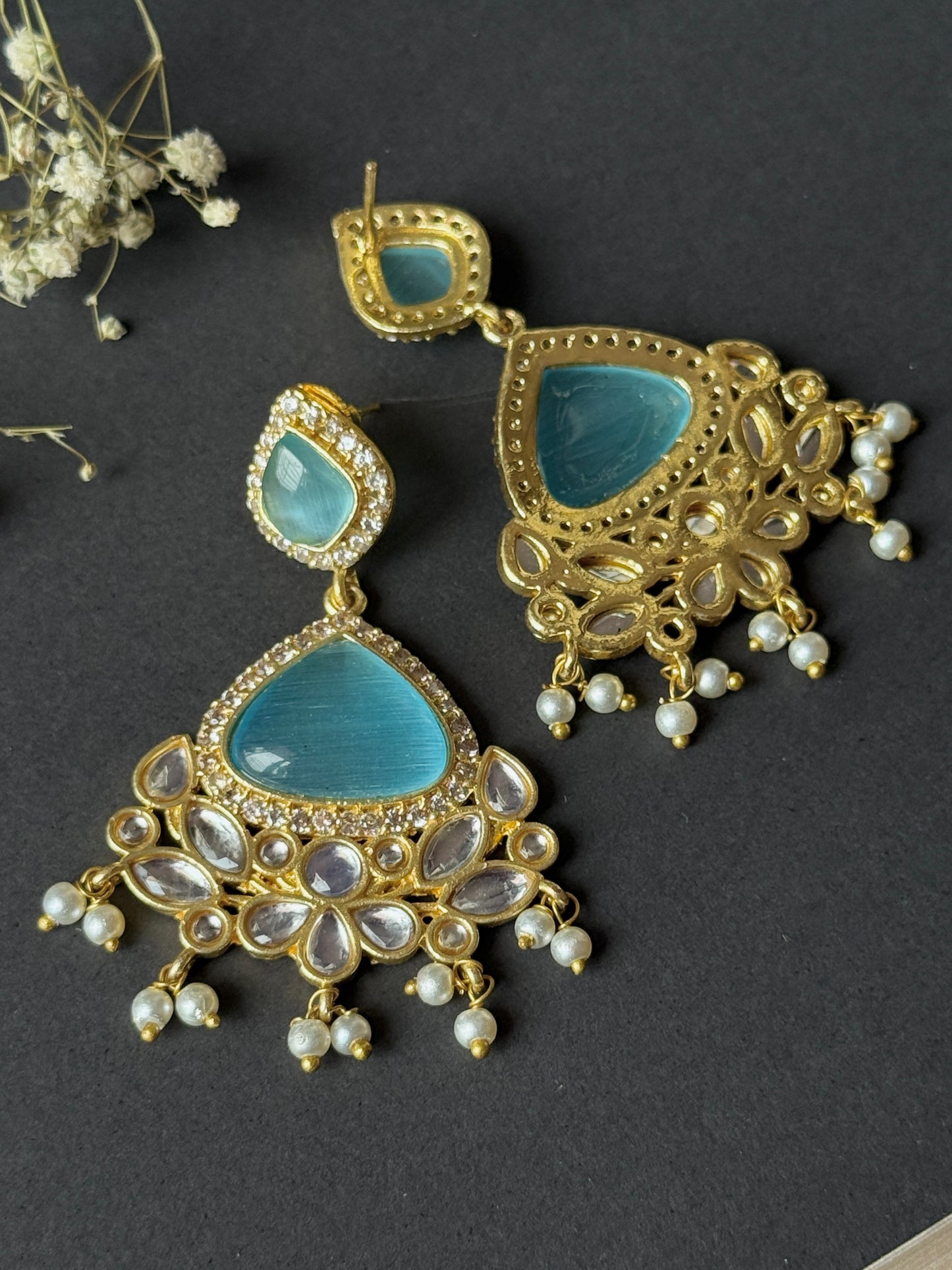 Silk Stone Embedded Party Wear Golden Earrings