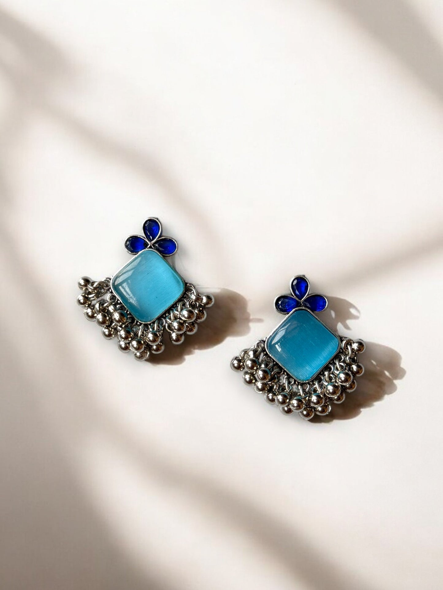 Elegant Blue Monalisa Stone Brass Earrings