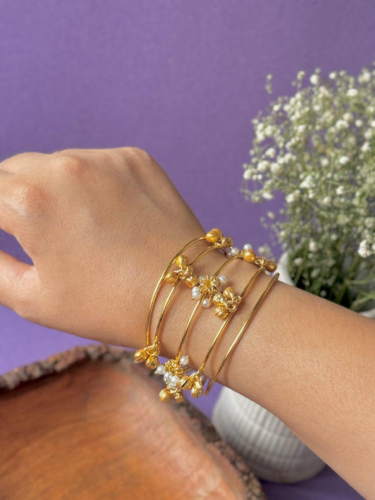 Pearls and Ghungroo Embedded Adjustable Golden Bracelet – Free Size