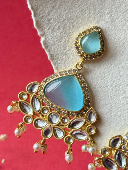 Silk Stone Embedded Party Wear Golden Earrings
